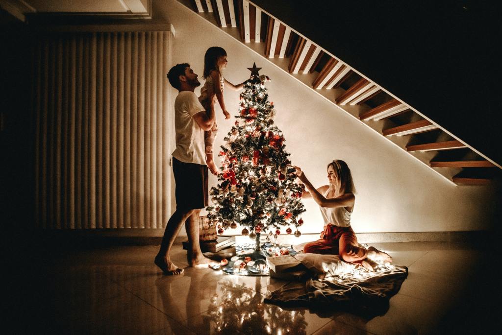 Family around christmas tree